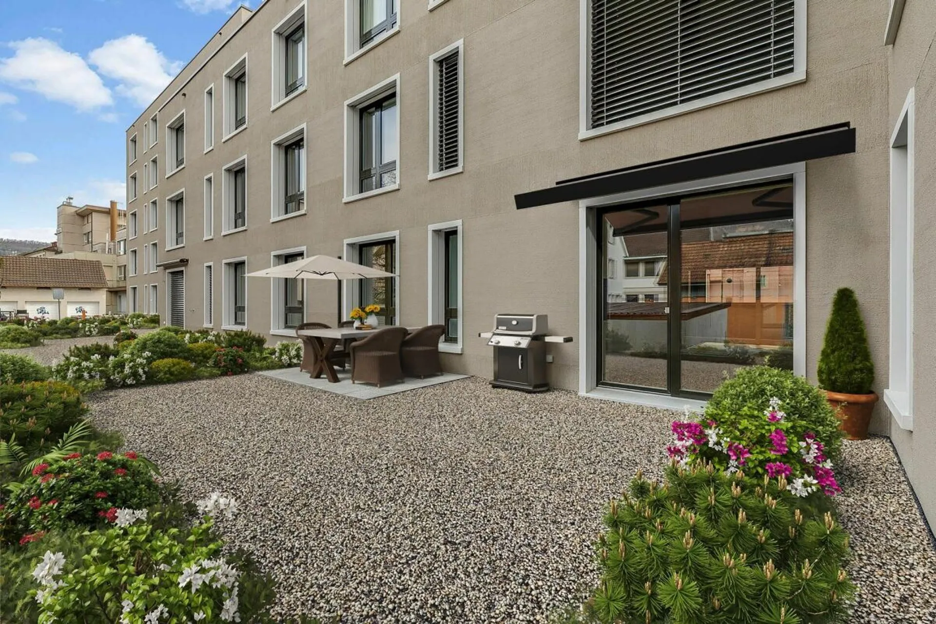 Erstvermietung - Attraktive 3 1/2-Zimmer-Gartenwohnung mit Loggia und Gartensitzplatz im Zentrum von Sissach