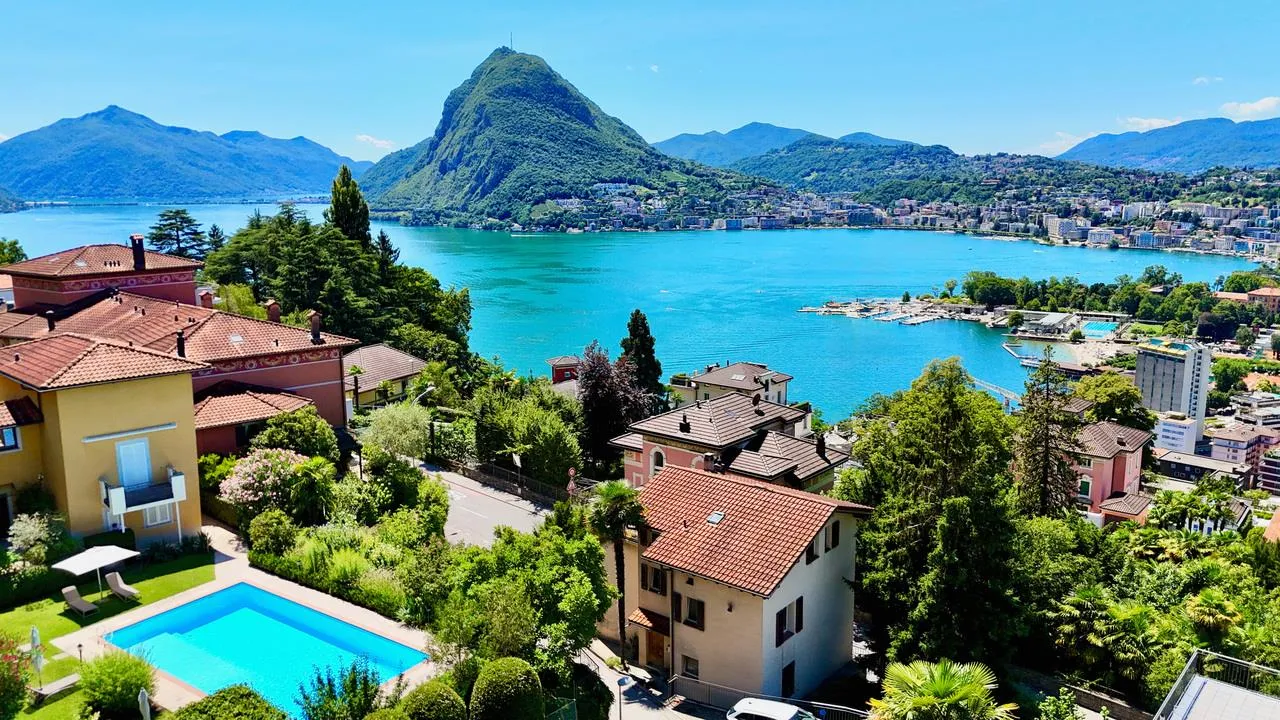 Appartamento con Vista Mozzafiato sul Lago di Lugano e Sulla città