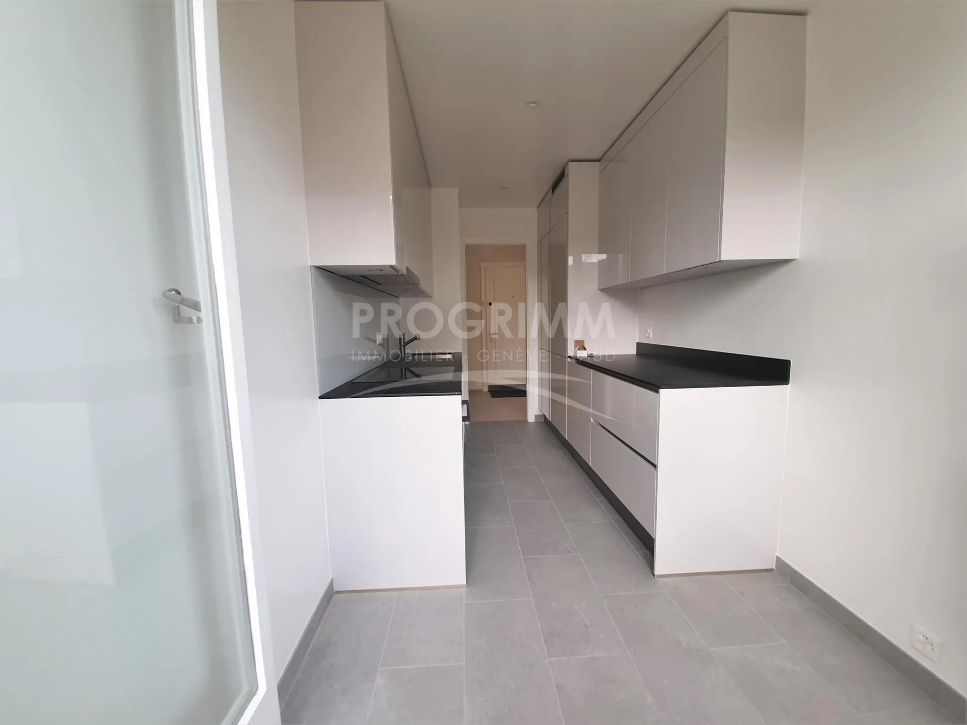 Exclusivité Champel - Appartement neuf et loué de près de 82m2 PPE - Avec parking et box