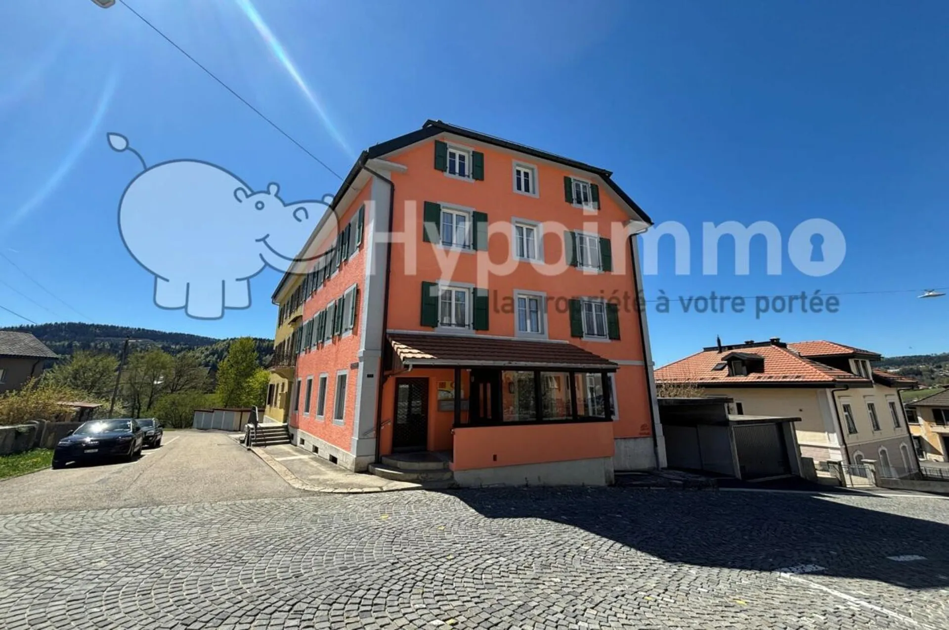 Bel immeuble familial avec terrasse et jardin