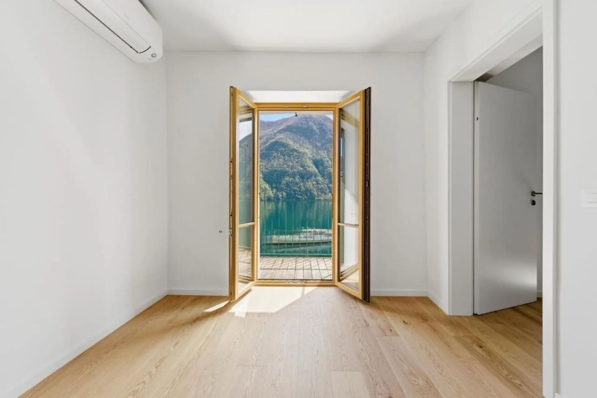 Wunderschöne Seeuferwohnung in Gandria mit kleinem Privatsteg