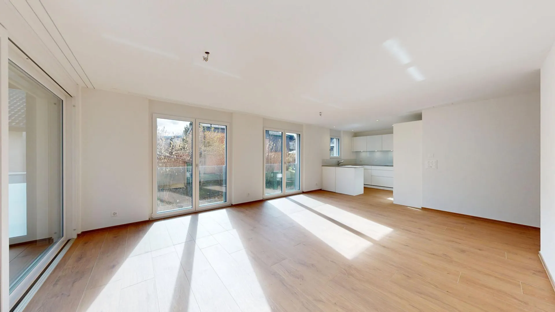 Moderne 4.5-Zimmer-Wohnung mit Einstellhallenplatz und Wintergarten