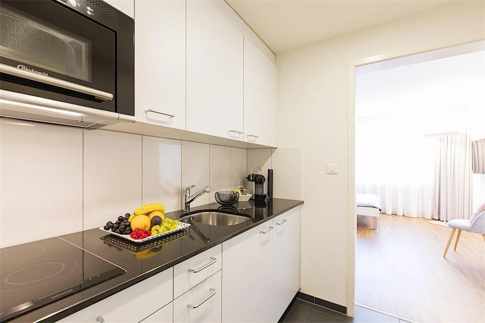 Apartmenthaus im Herzen der Basler Altstadt / Your home in the heart of the old town Basel