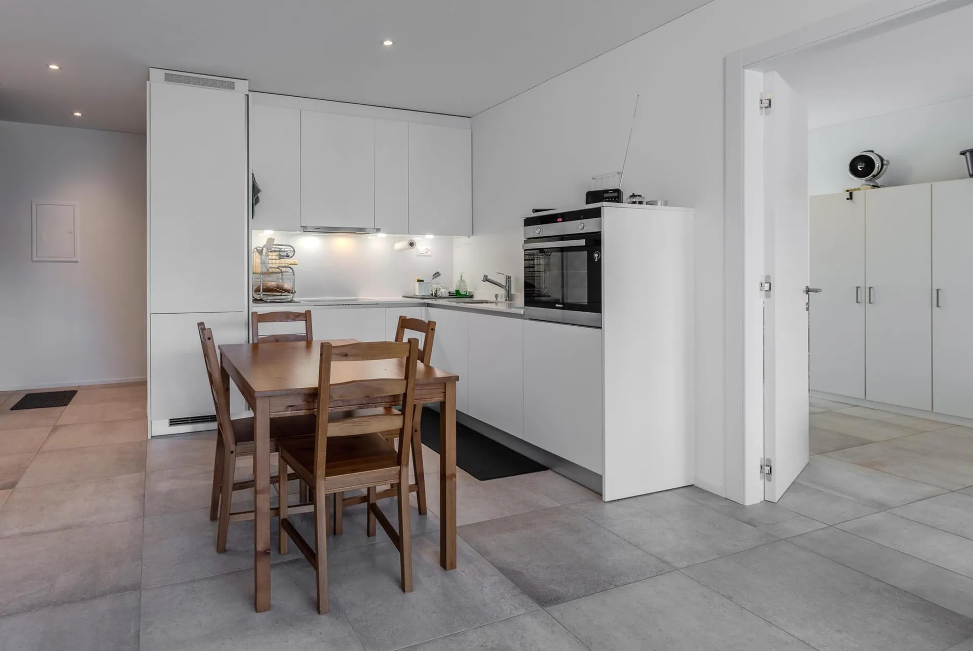 ELEGANTE AMPIO E MODERNO 2.5 LOCALI CON TERRAZZA AD AGNO