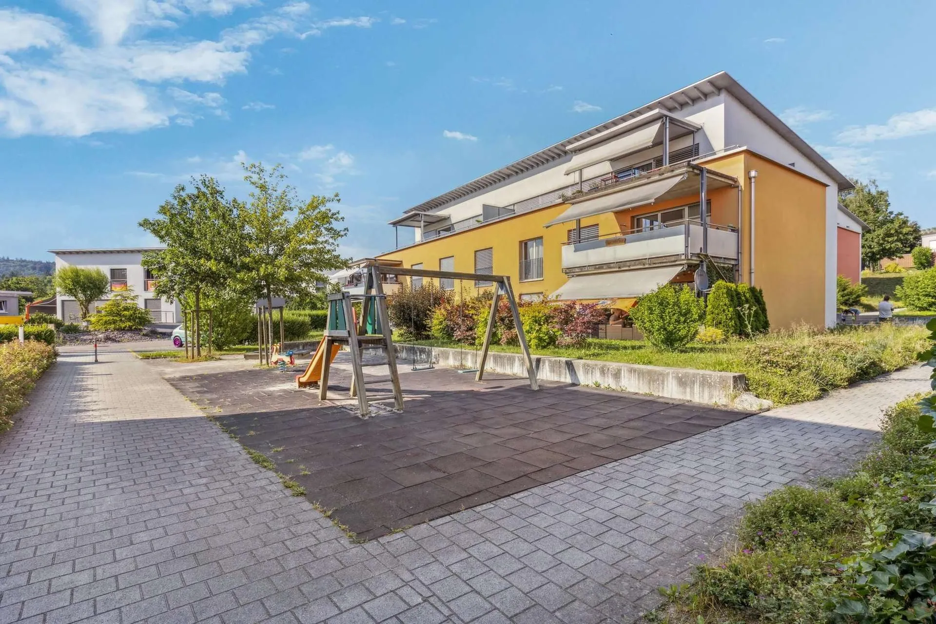 Lebensqualität am Rhein - Eigentumswohnung mit Gartenfläche in Dachsen