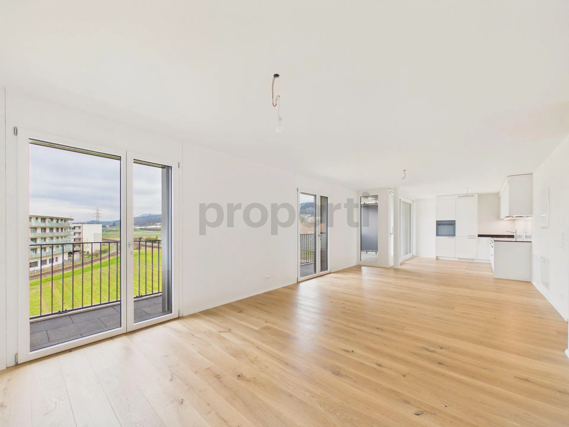 1.5-Zimmer-Neubau-Wohnung mit Balkon in Buchs ZH (mit möglicher Wandlung zu 2.5)