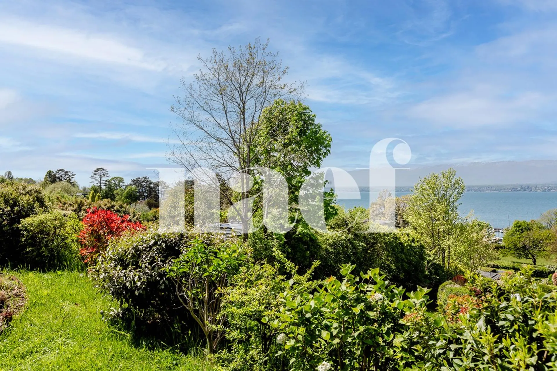 Bel appartement en rez-de-jardin avec vue lac