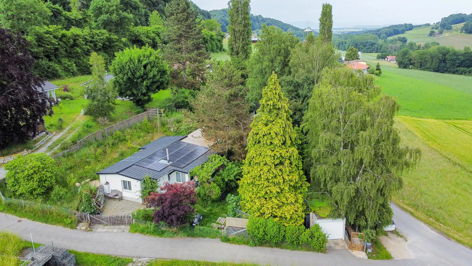 Cottage de plain-pied dans un havre de verdure Parcelle de 1'415 m2