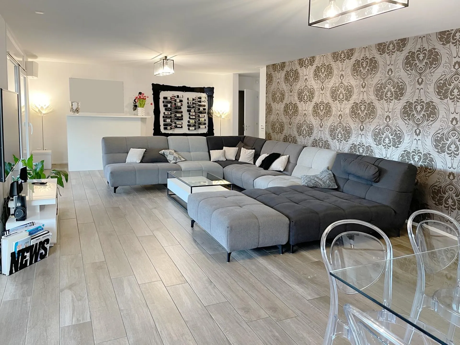 Bellissimo ultimo piano 5,5 di design con enorme terrazza vista lago.