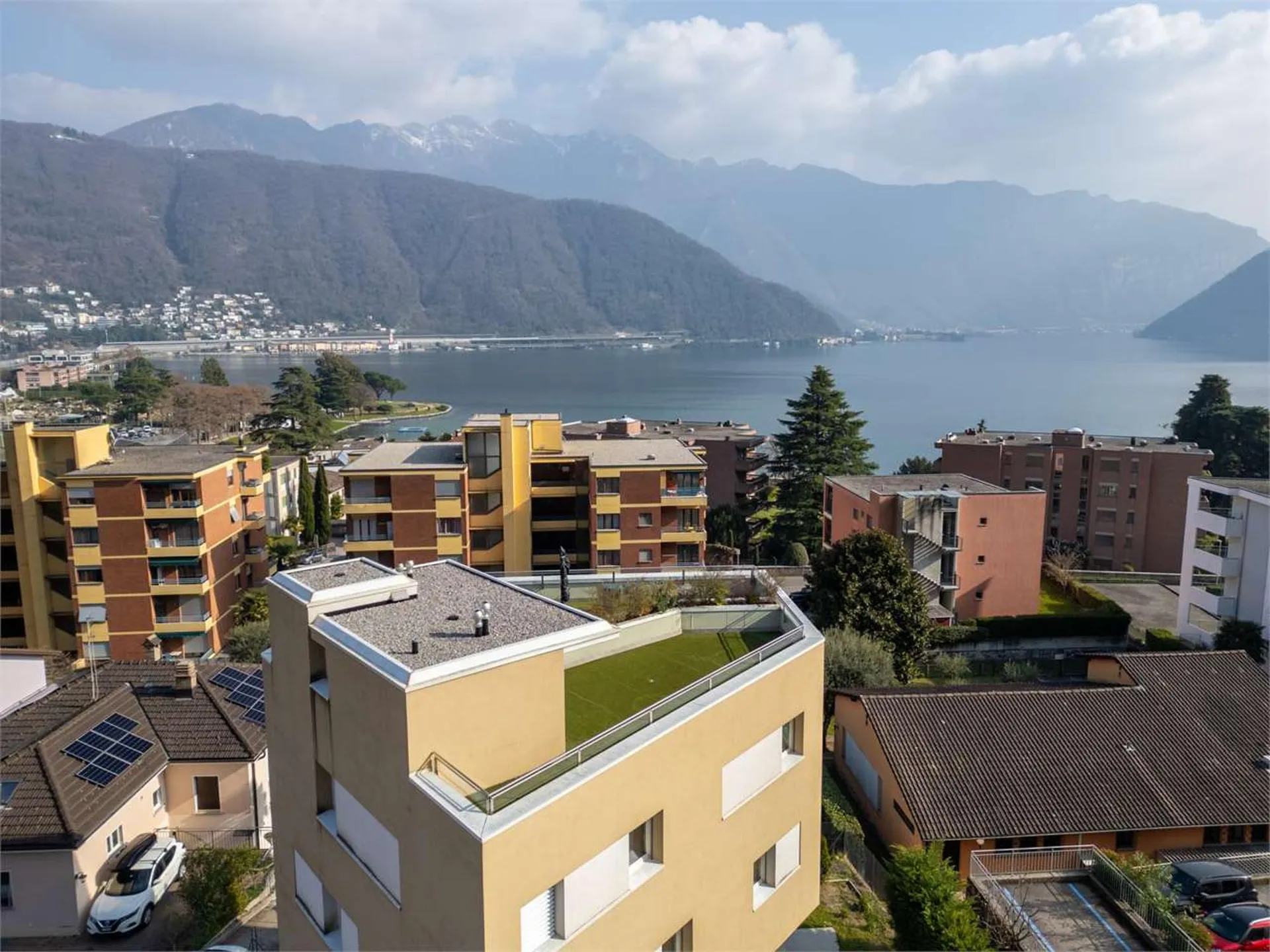 Melide - moderno 4.5 loc. con vista lago e roof-top