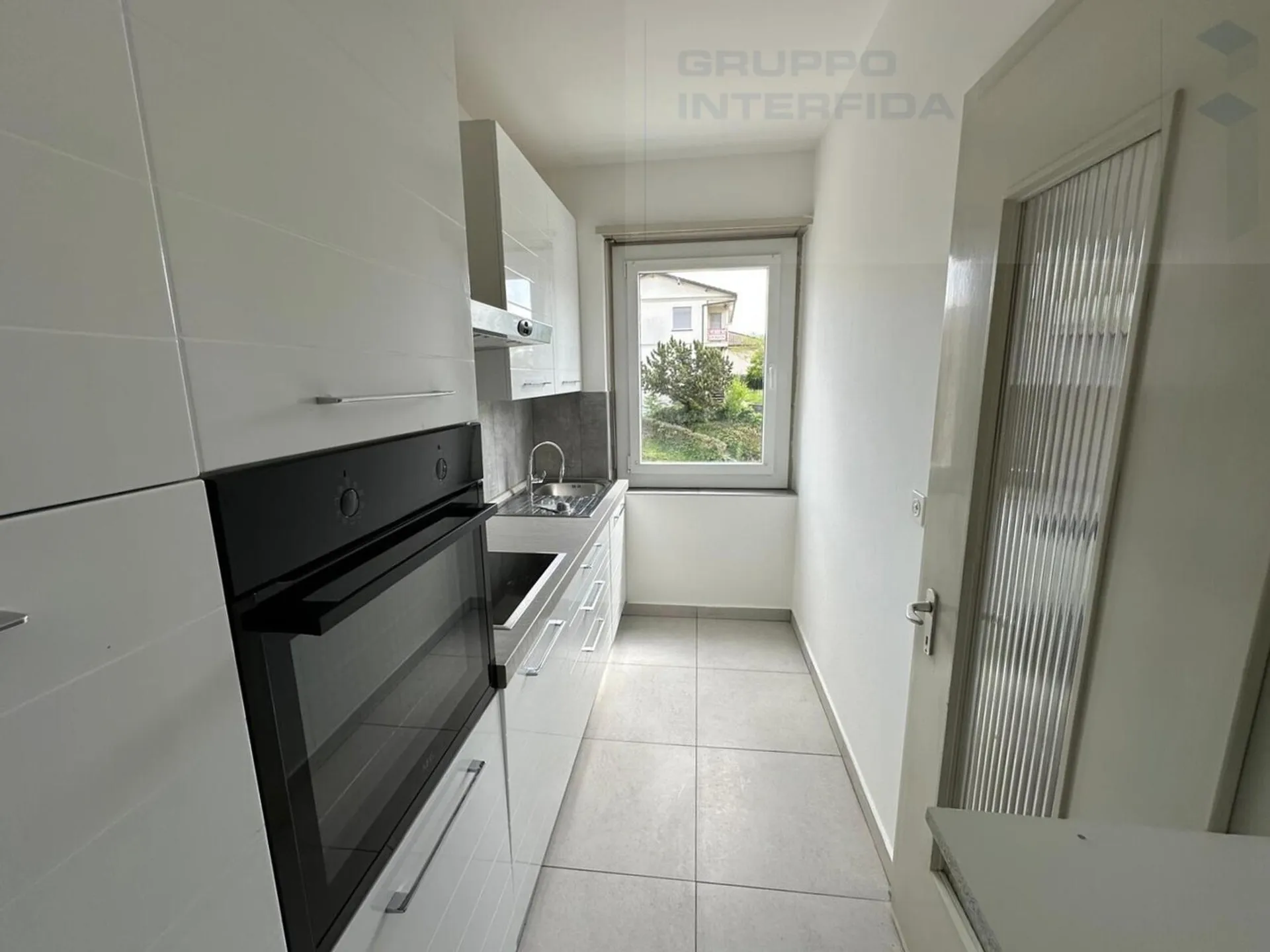AMPIO 3.5 LOCALI CON BALCONE E POSTO AUTO