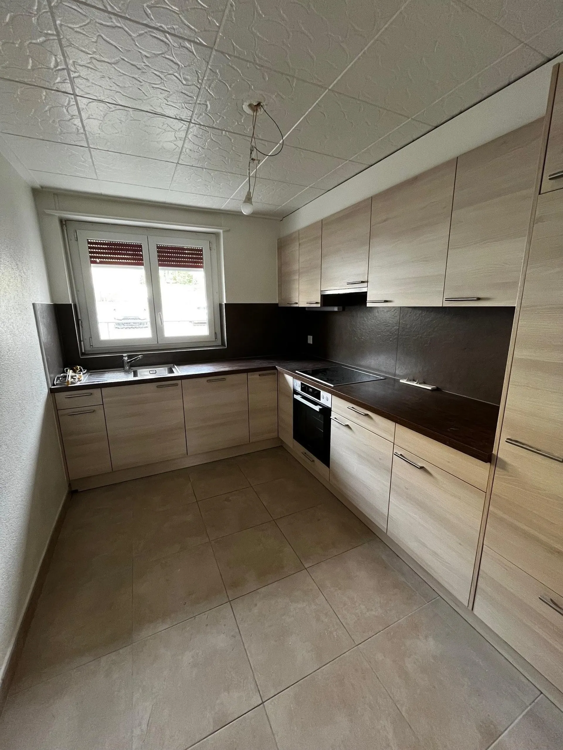 Charmant appartement rénové de 3 pièces avec balcon à Neuchâtel