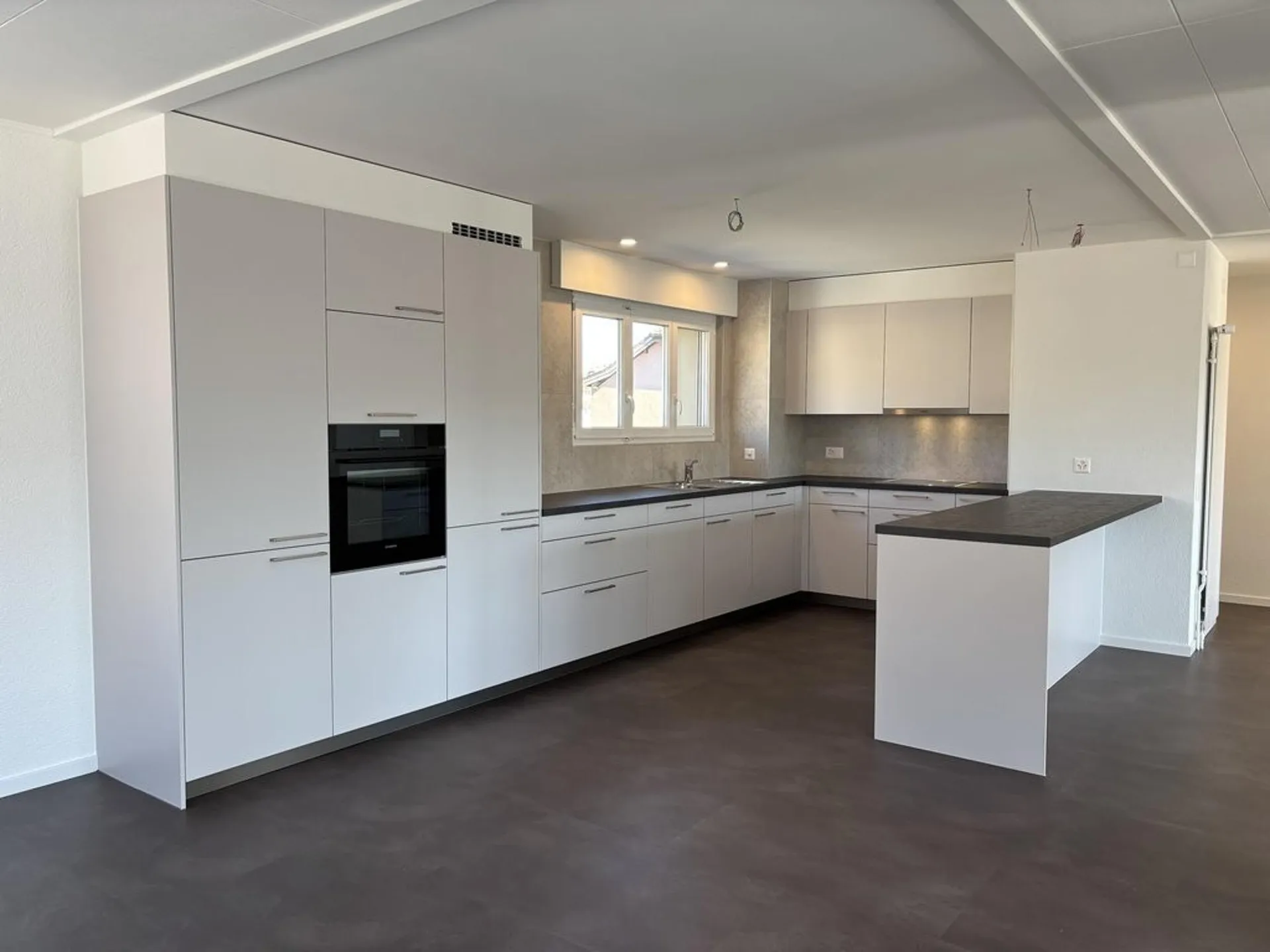 Spacieux appartement en attique avec grand balcon