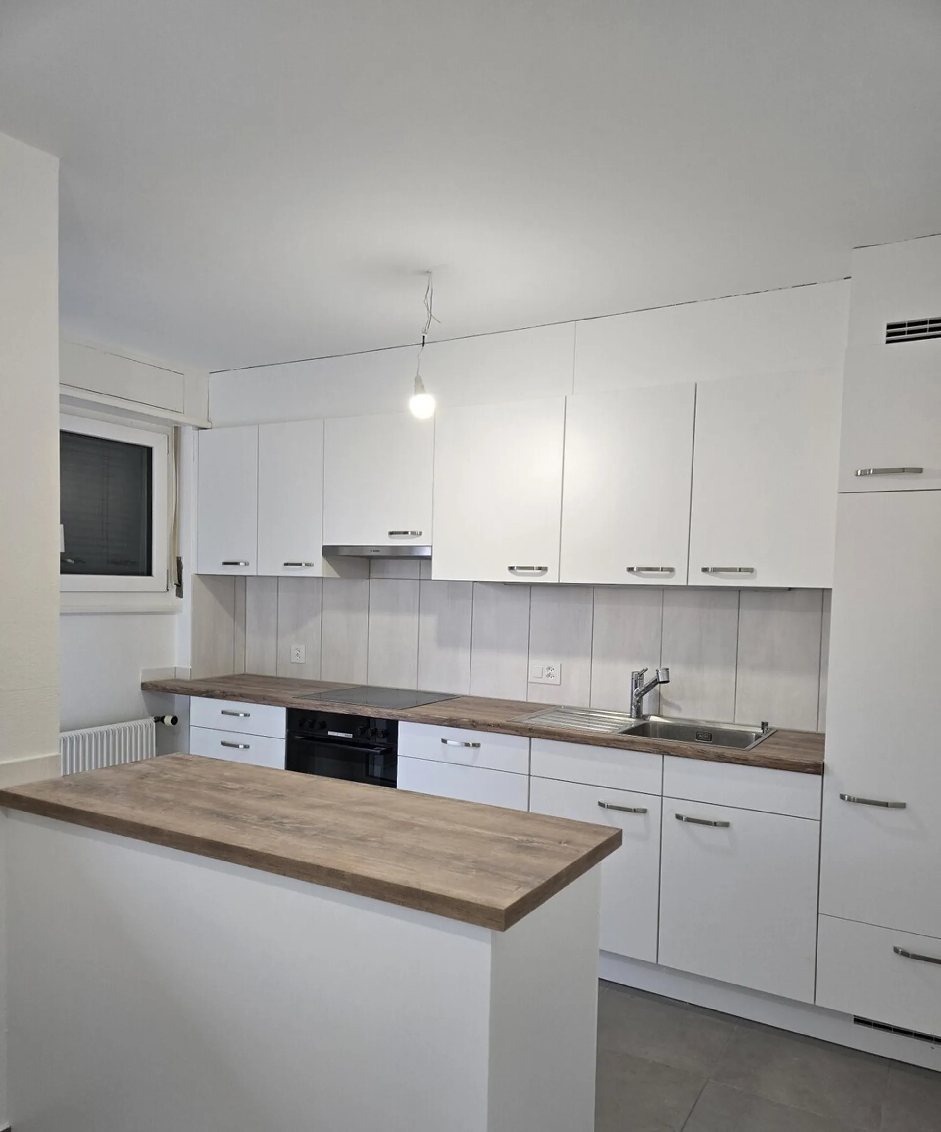 Appartement 4,5 pièces de 88 m2 au 1er étage sans ascenseur