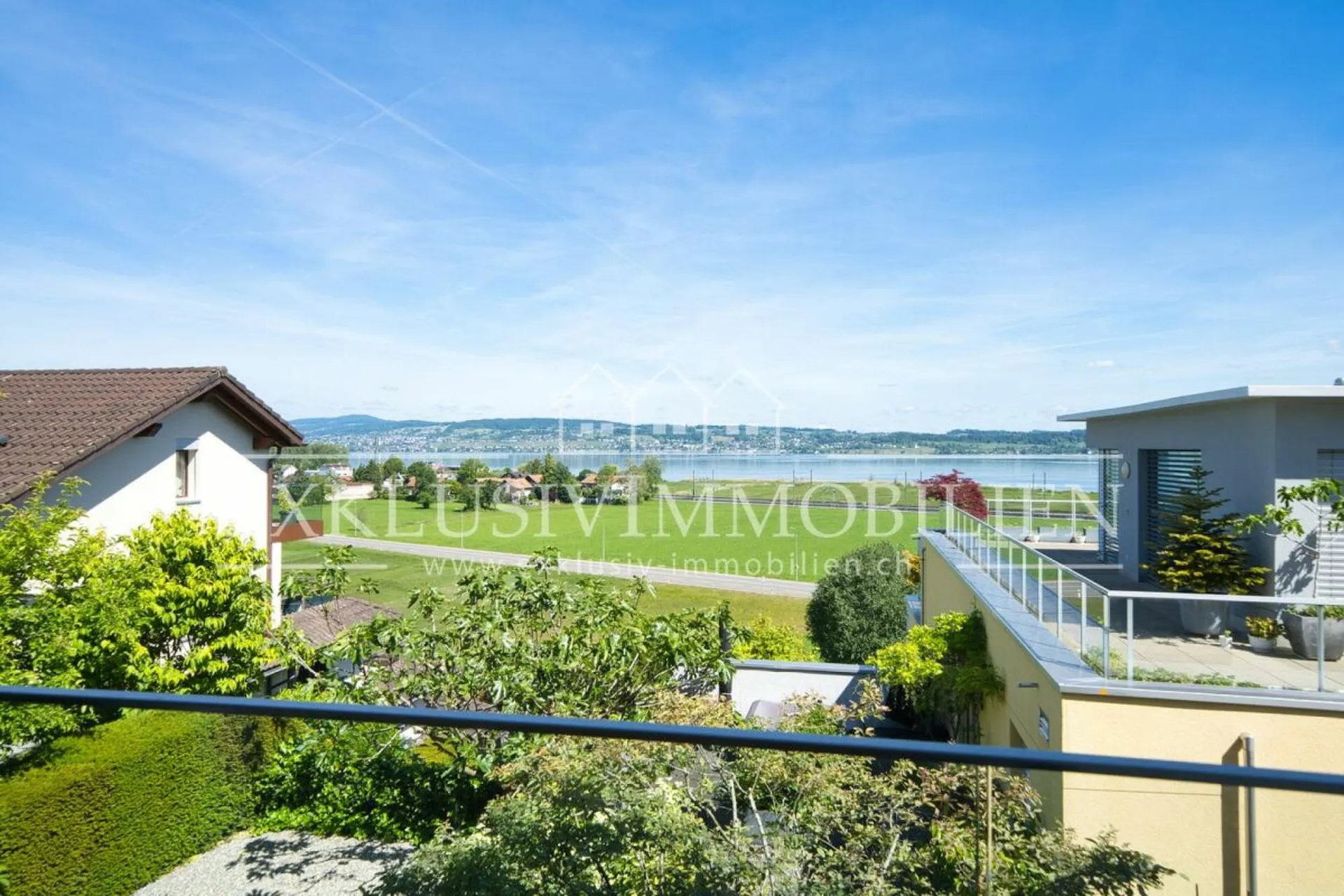 Luxuswohnung mit See- & Weitblick und lichtdurchflutetem Wintergarten