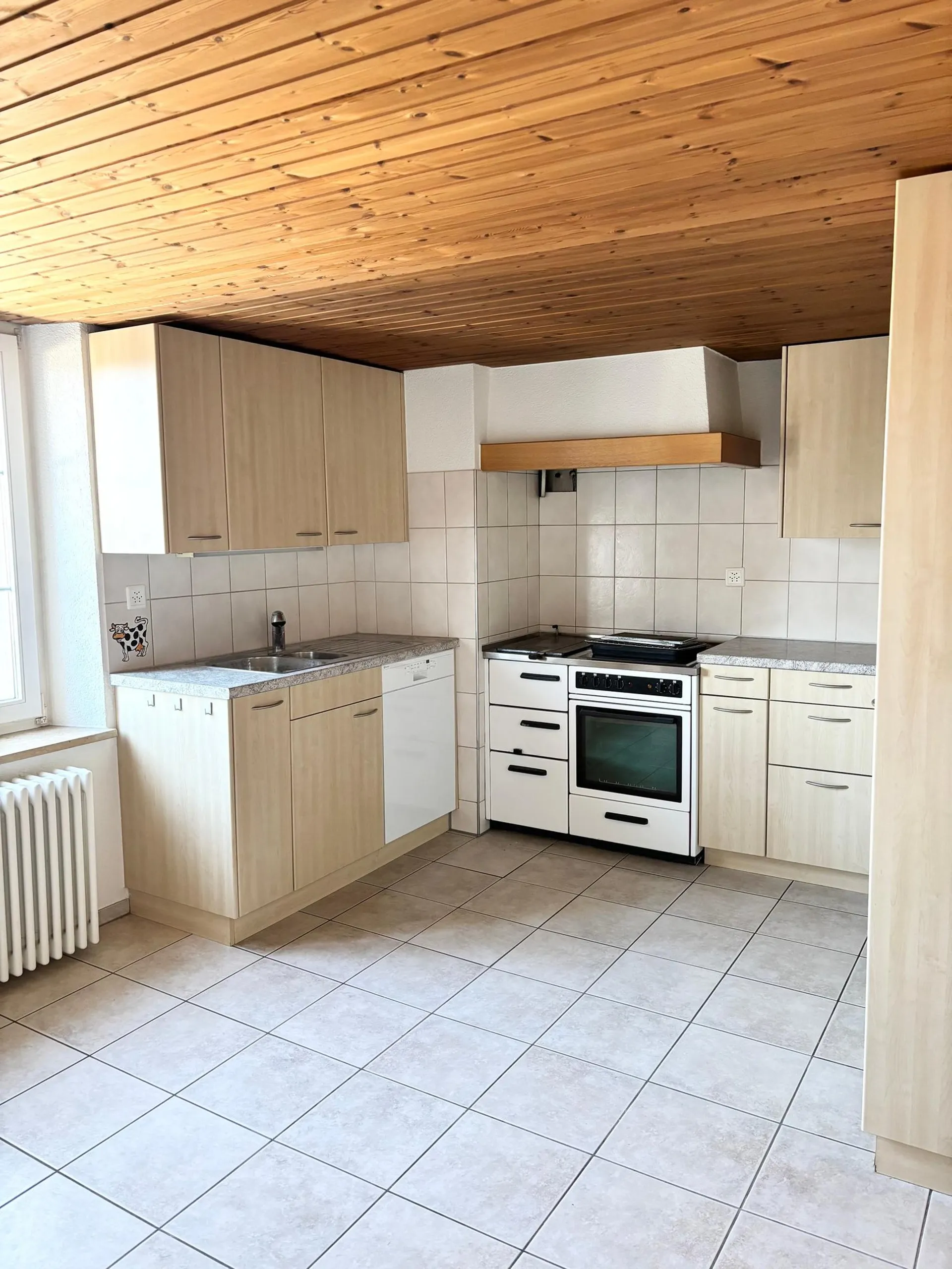 Gemütliche Dachwohnung mit Gartensitzplatz